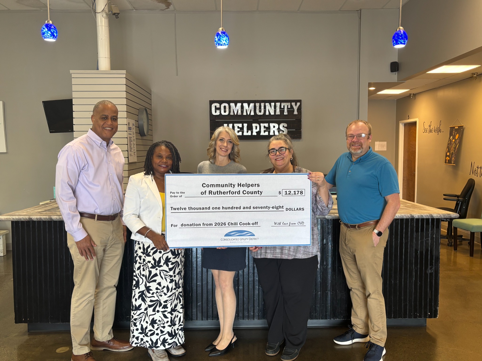 Community partners presenting financial support to CHORC